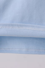 Load image into Gallery viewer, Blue construction embroidery top