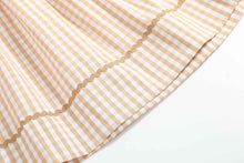 Load image into Gallery viewer, Brown Gingham Football Smocked Bishop Dress