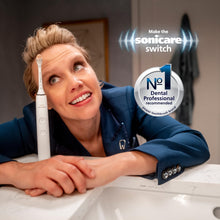 Load image into Gallery viewer, Philips Sonicare ProtectiveClean 5300 Rechargeable Electric Toothbrush, with Pressure Sensor, 3 Cleaning Modes, SmarTimer and QuadPacer, with 2 Bonus Brush Heads, Travel Case, Black, Model HX6423/34
