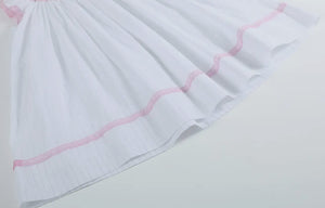 White and Light Pink Cross Bishop Dress