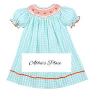 Smocked Dress with Embroidered Pumpkin and Geometric Pattern