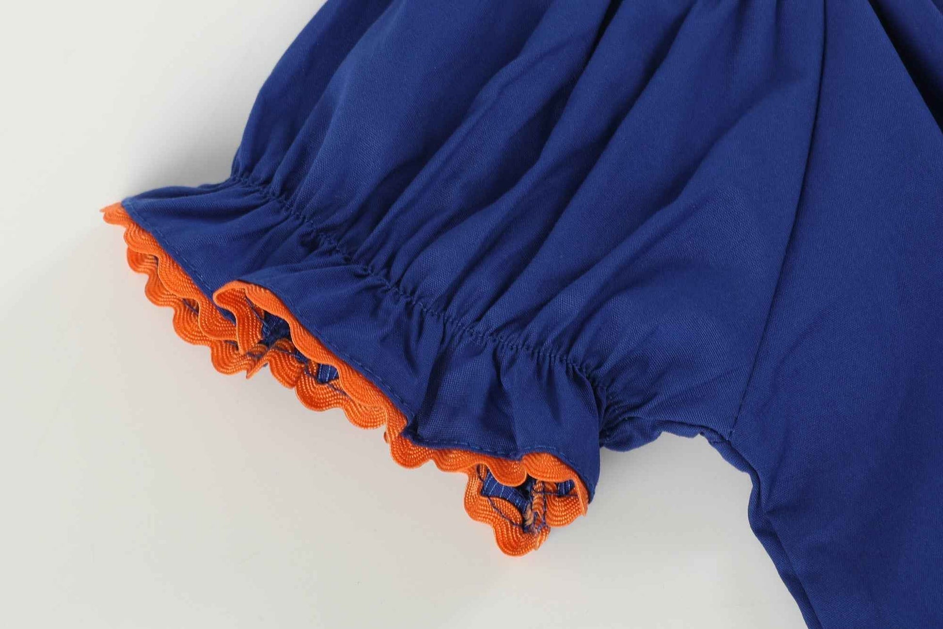 Blue and Orange Football Smocked Bishop Dress - Abbies Place