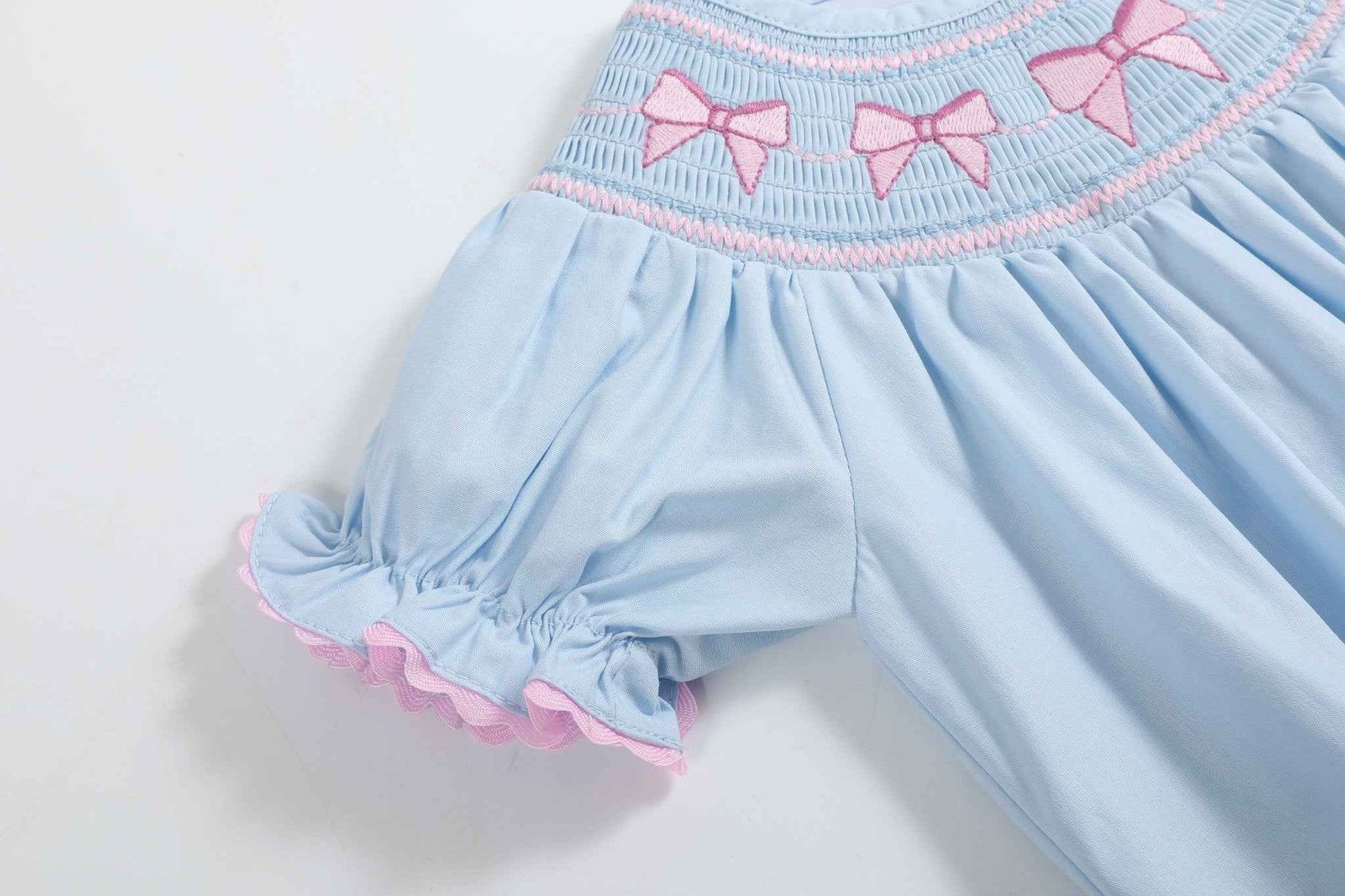 Blue and Pink Bow Smocked Romper - Abbies Place