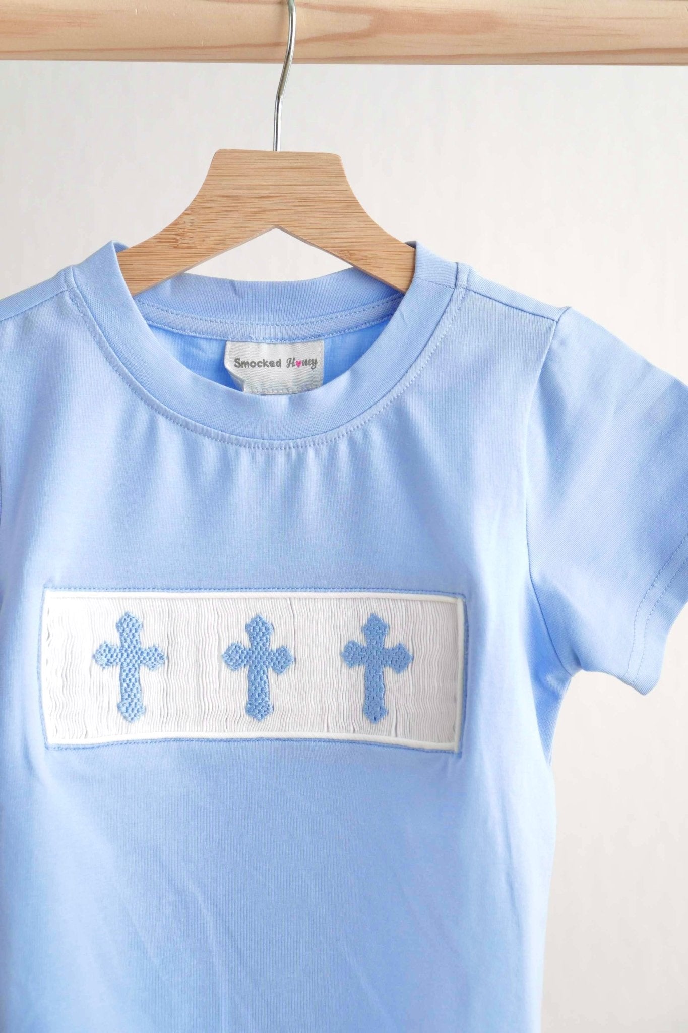 Blue easter cross hand-smokced boy top - Abbies Place
