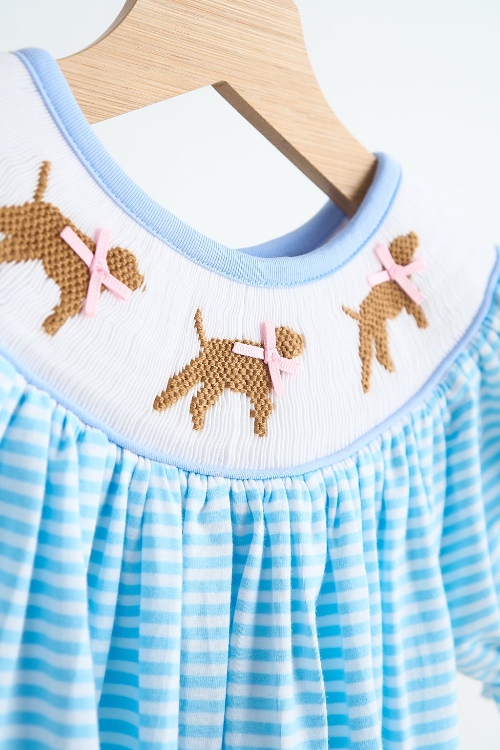 Blue puppy hand smocked girl romper - Abbies Place