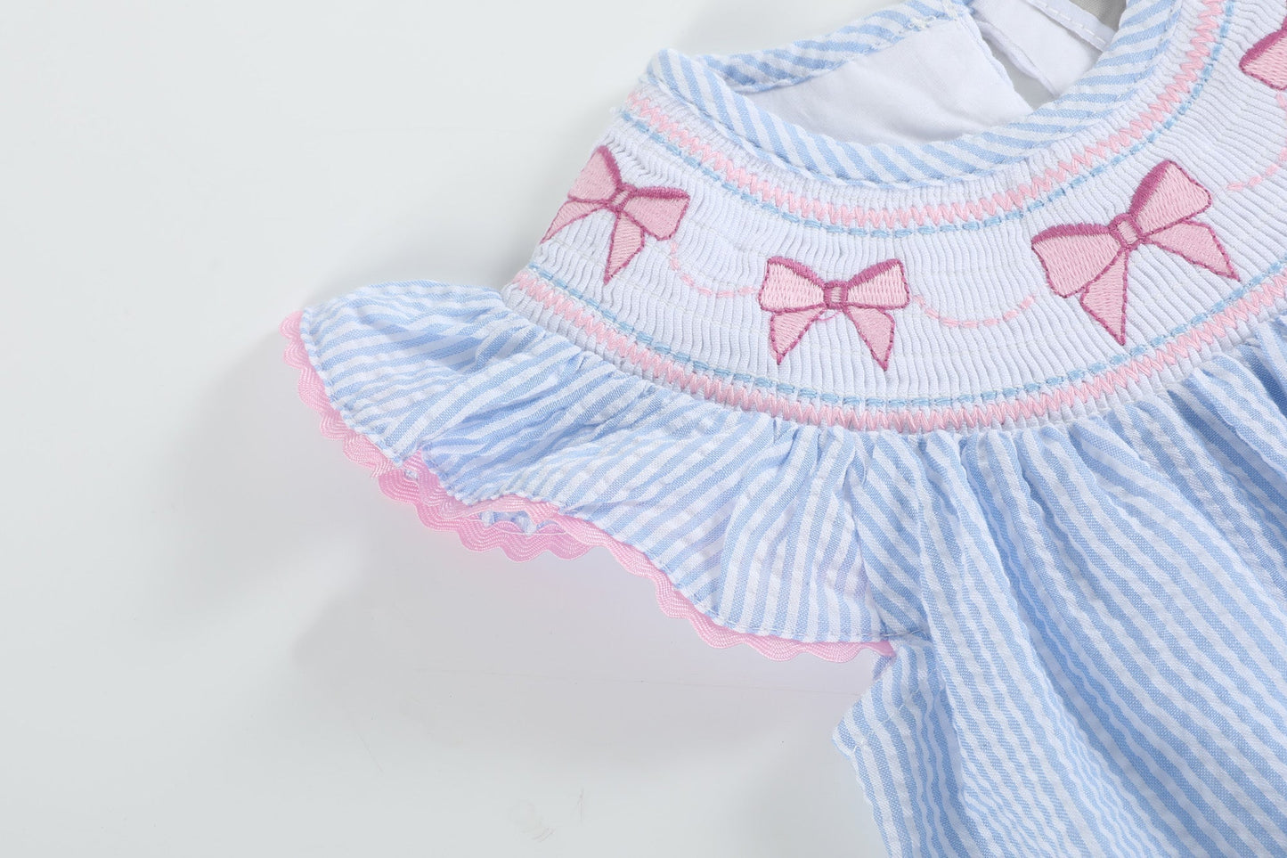 Blue Seersucker Bow Smocked Flutter Romper - Abbies Place