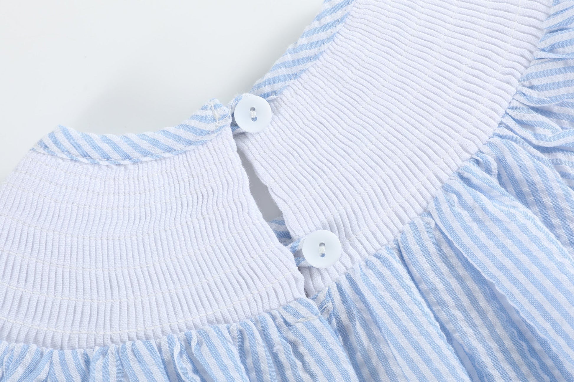 Blue Seersucker Bow Smocked Flutter Romper - Abbies Place