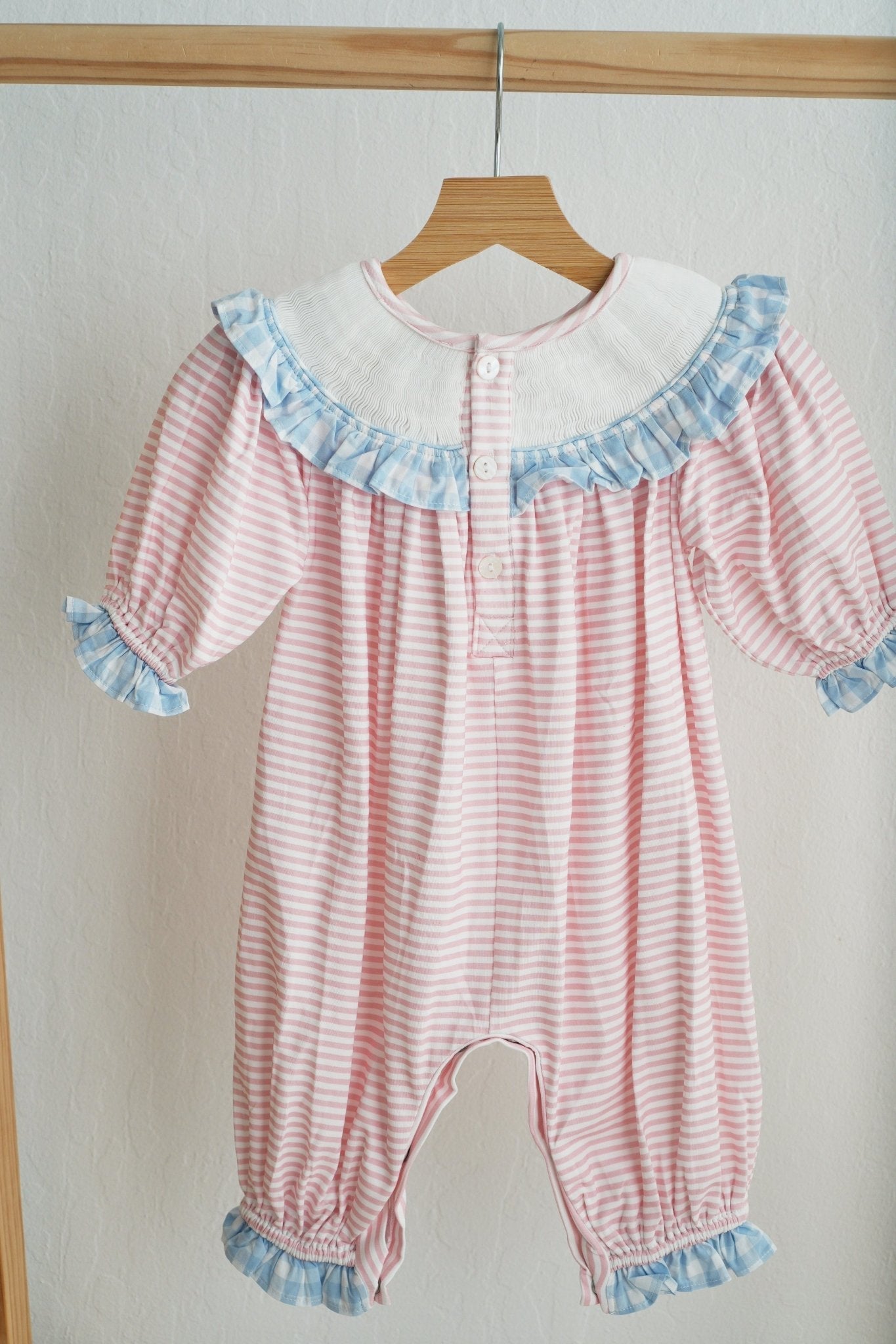 Pink candy cane bow hand smocked ruffle romper - Abbies Place