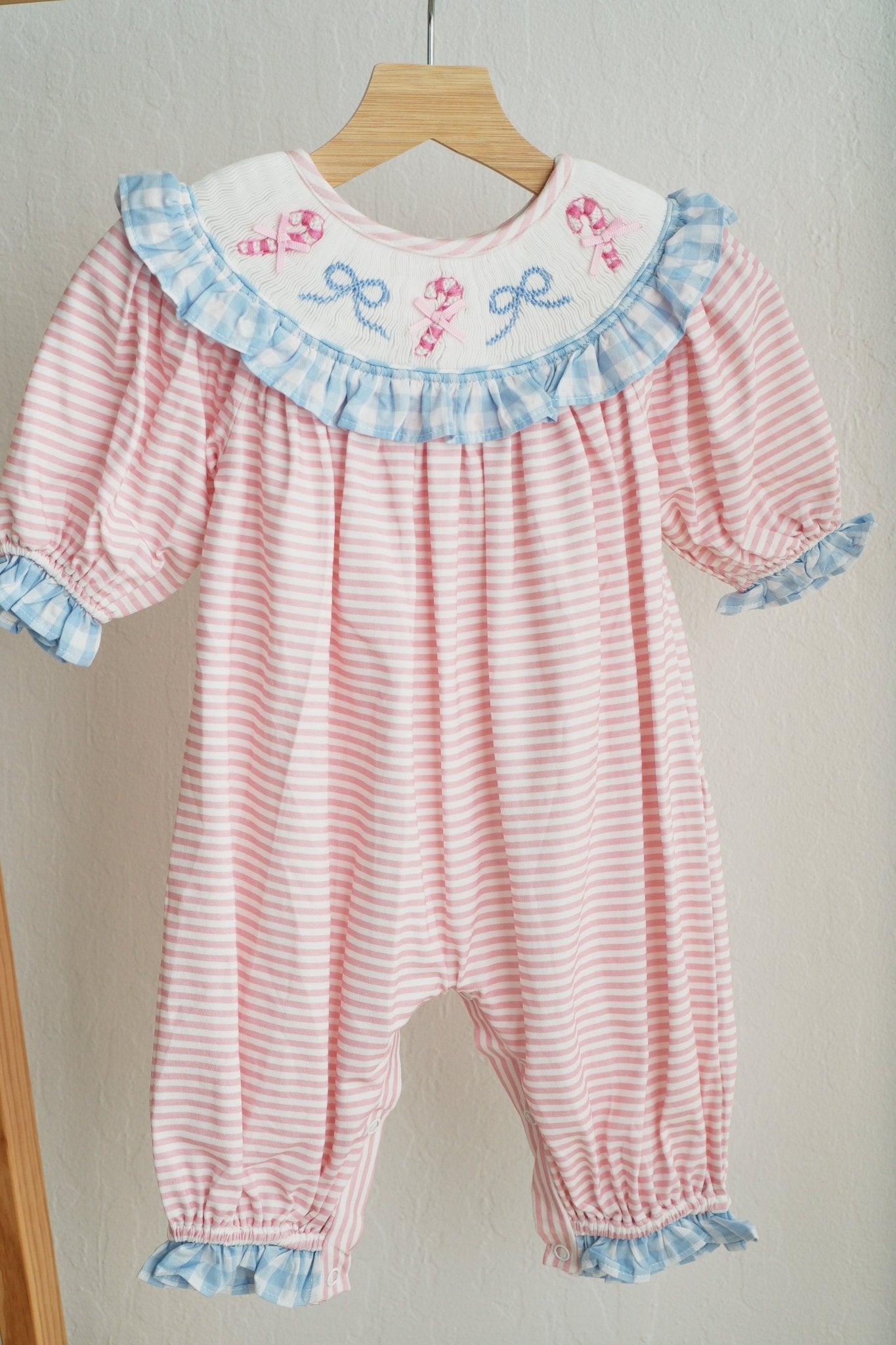 Pink candy cane bow hand smocked ruffle romper - Abbies Place