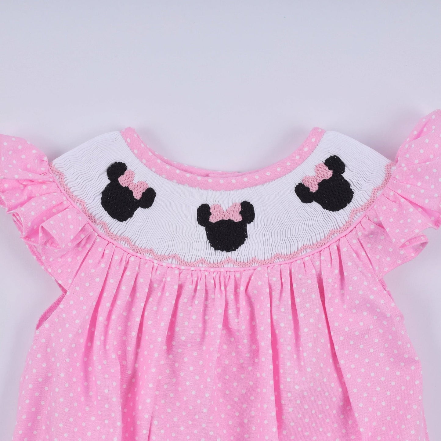 Pink character hand smocked dot ruffle bubble - Abbies Place