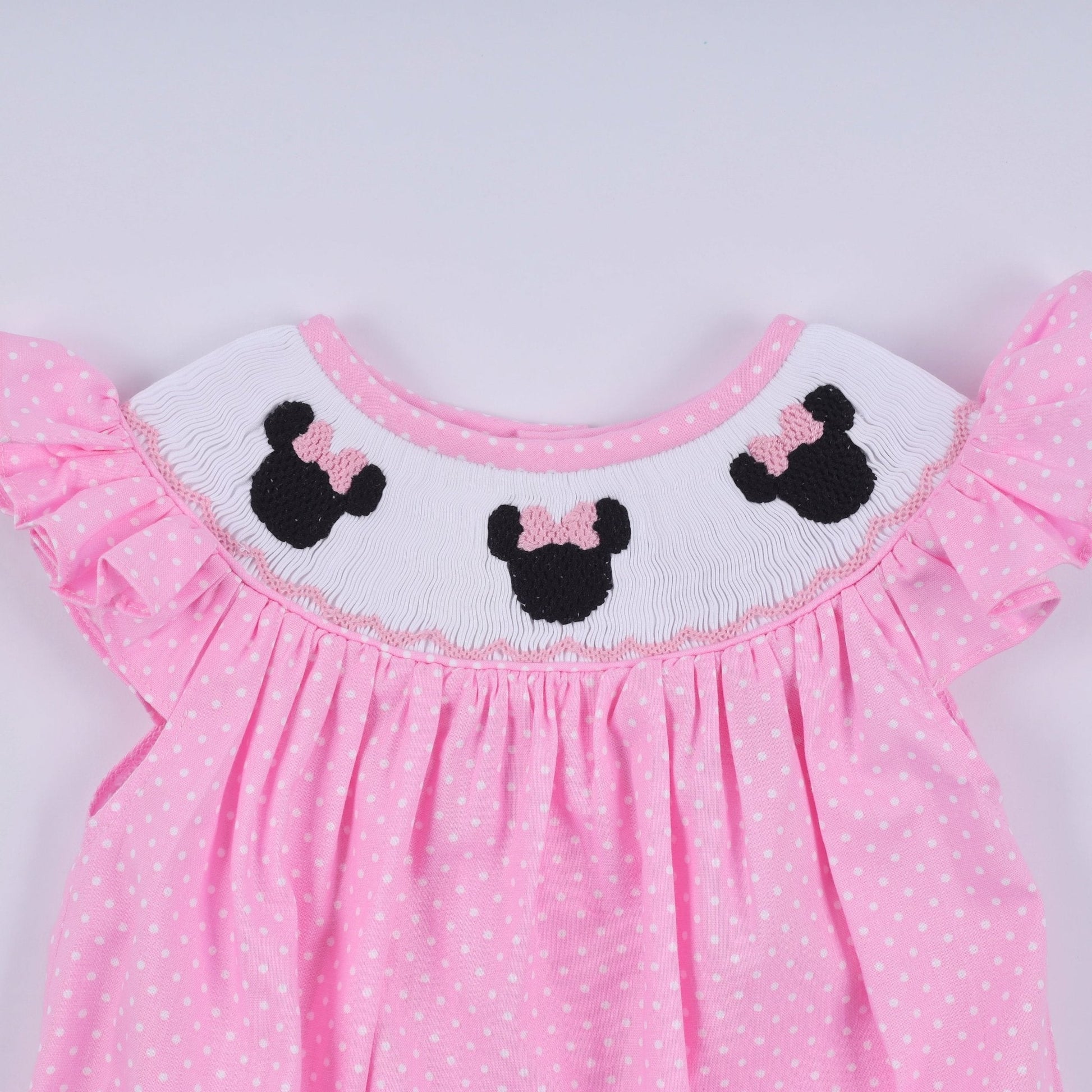 Pink character hand smocked dot ruffle bubble - Abbies Place