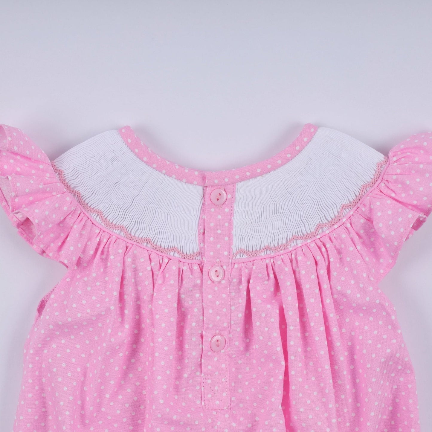 Pink character hand smocked dot ruffle bubble - Abbies Place