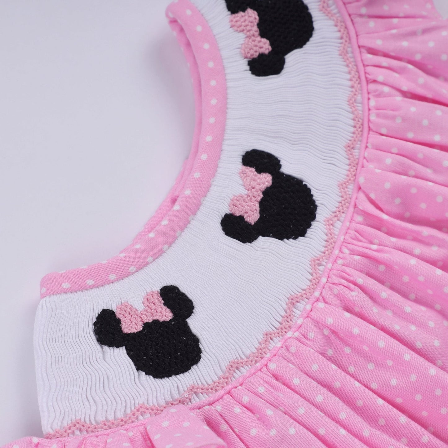 Pink character hand smocked dot ruffle bubble - Abbies Place