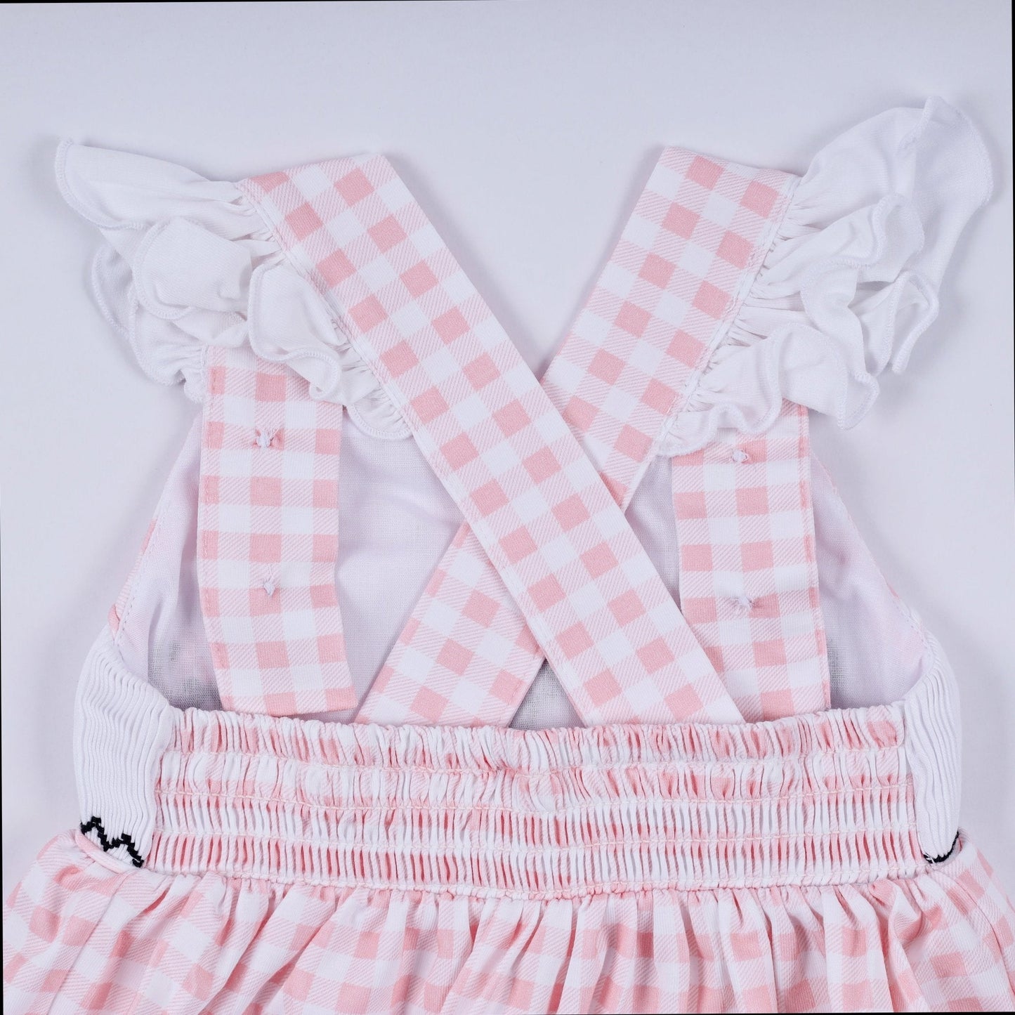 Pink character hand smocked gingham ruffle bubble - Abbies Place