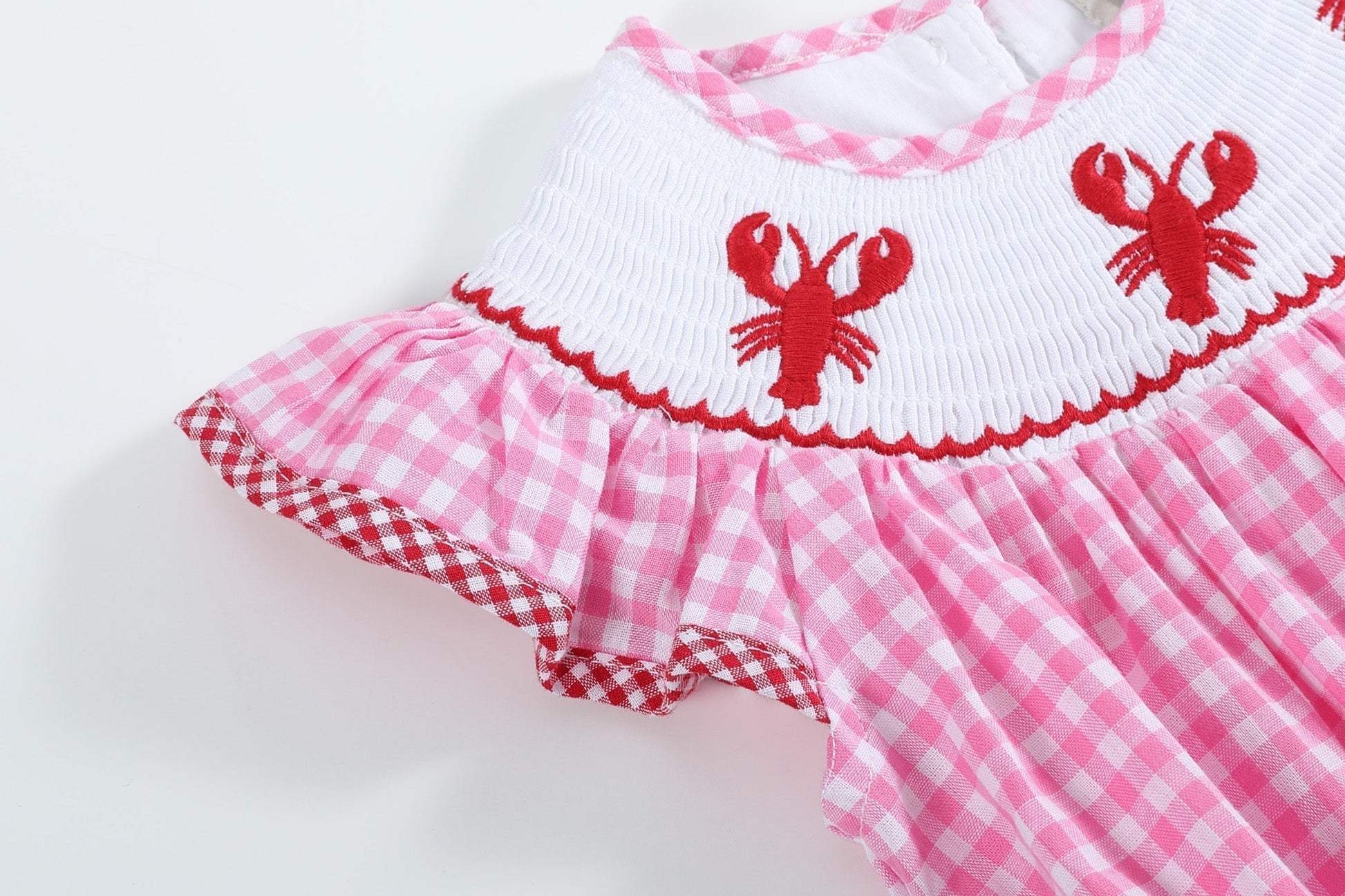 Pink Gingham Crawfish Smocked Flutter Romper - Abbies Place