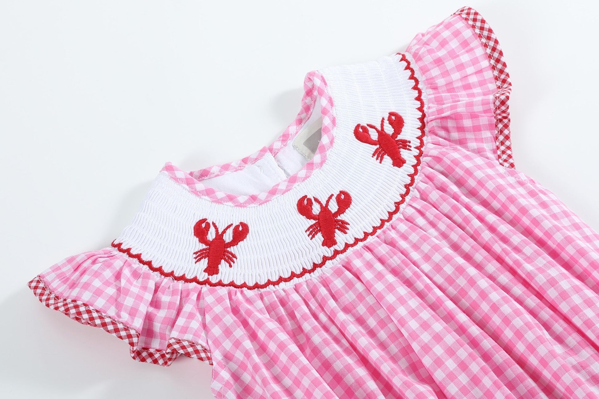 Pink Gingham Crawfish Smocked Flutter Romper - Abbies Place