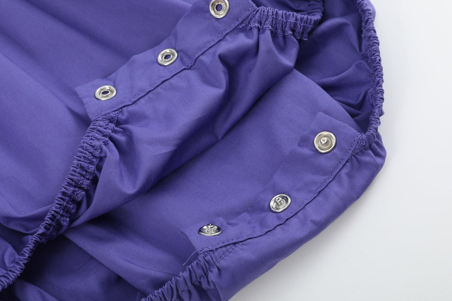 Purple and Green Mardi Gras Smocked Romper