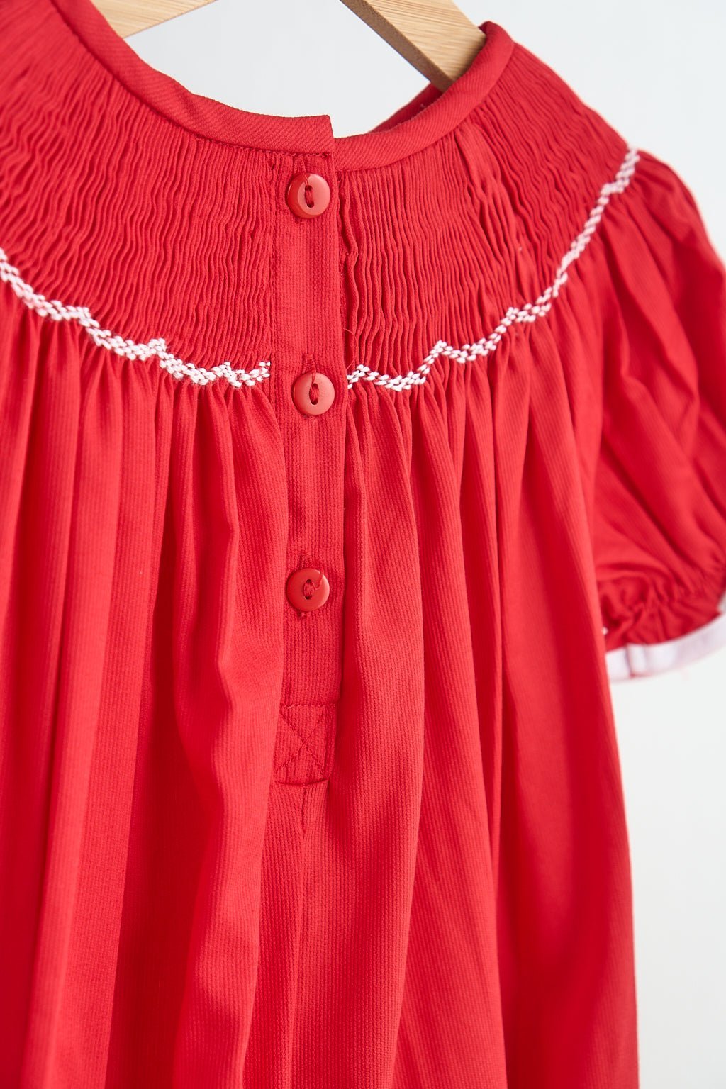 Red candy hand smocked girl romper - Abbies Place
