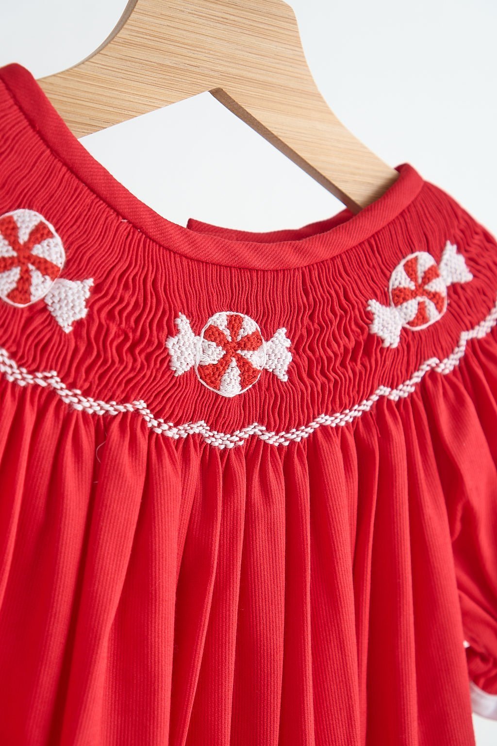 Red candy hand smocked girl romper - Abbies Place