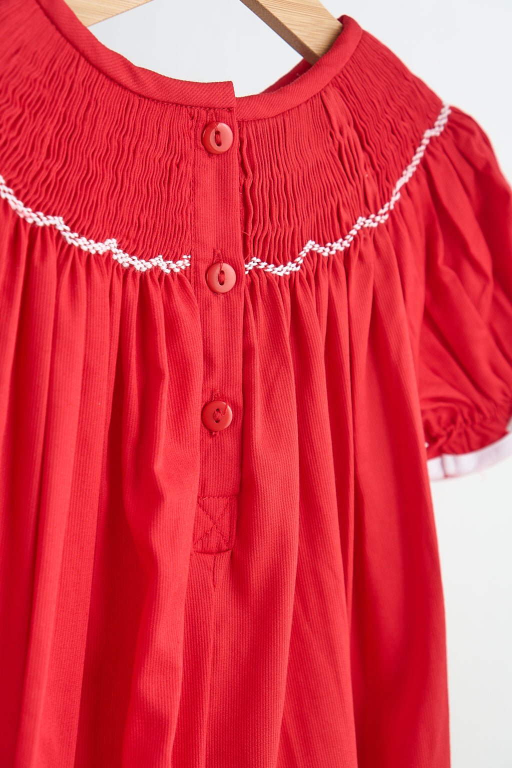 Red candy hand smocked girl romper - Abbies Place