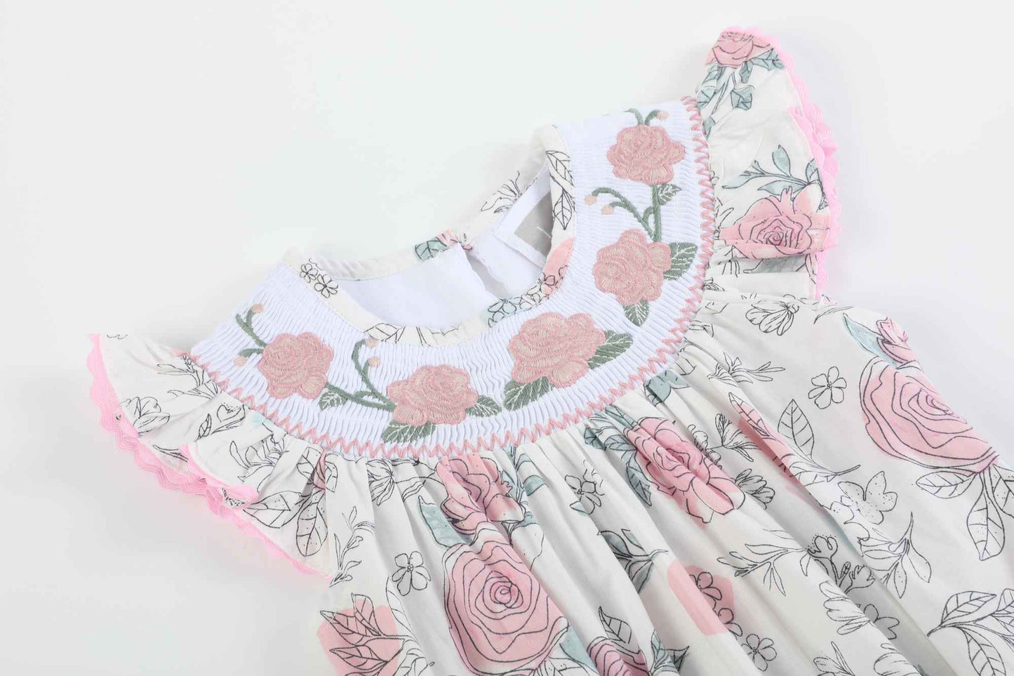 White and Pink Floral Smocked Flutter Romper