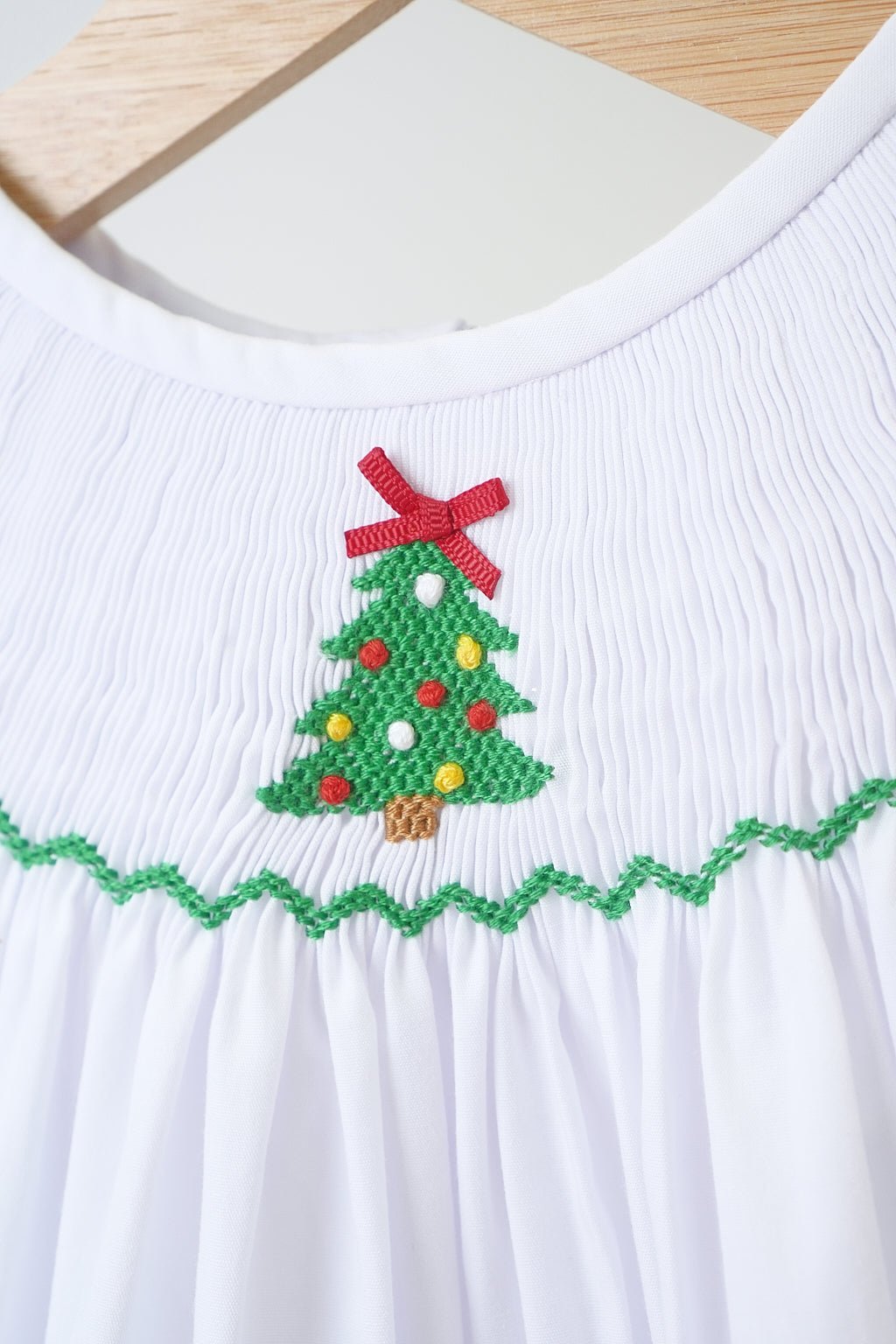 White chrismtas tree hand smocked girl romper - Abbies Place
