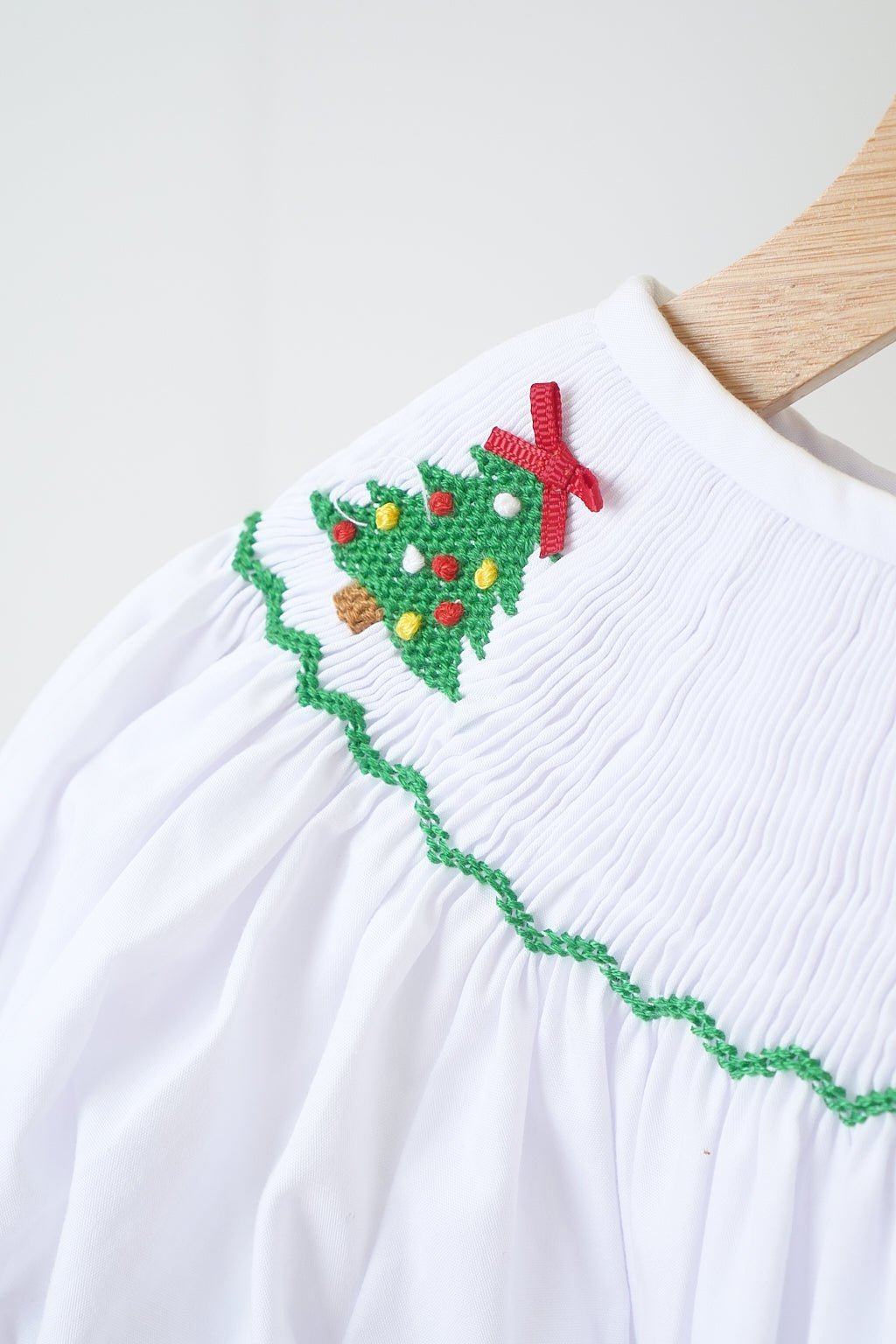 White chrismtas tree hand smocked girl romper - Abbies Place