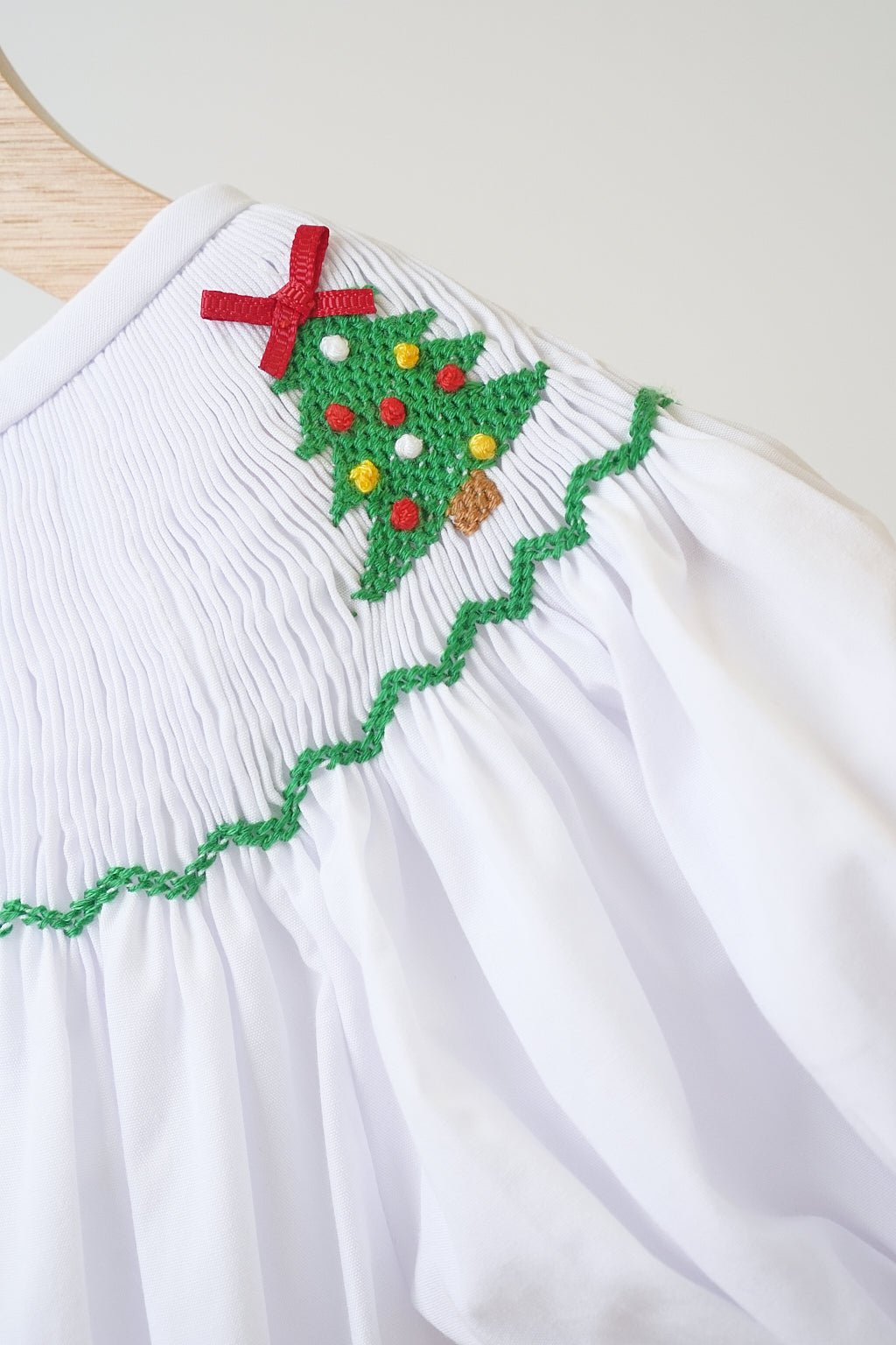 White chrismtas tree hand smocked girl romper - Abbies Place